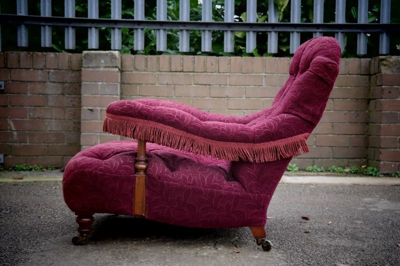 A Howard & Sons buttoned open armchair in Heavy Burgundy Fabric - Image 14