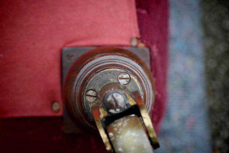 A Howard & Sons buttoned open armchair in Heavy Burgundy Fabric - Image 10