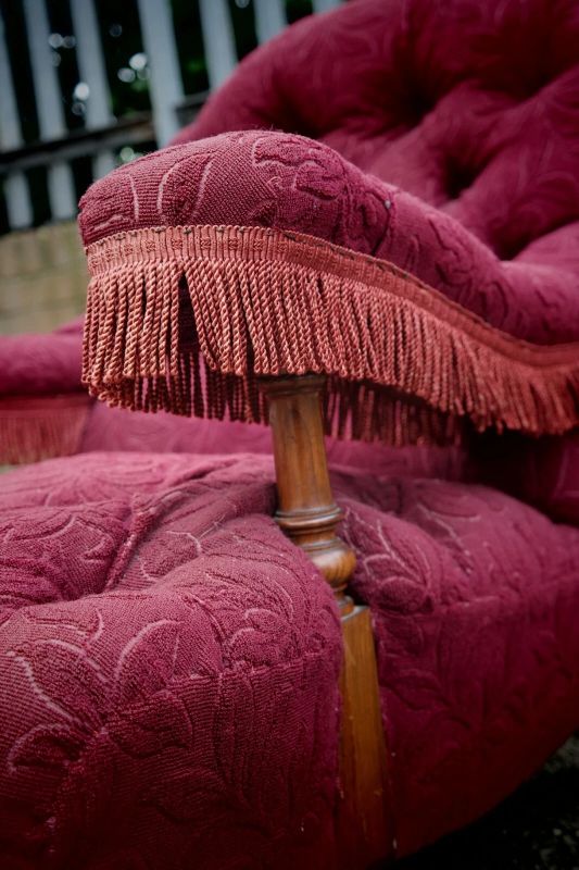 A Howard & Sons buttoned open armchair in Heavy Burgundy Fabric - Image 20