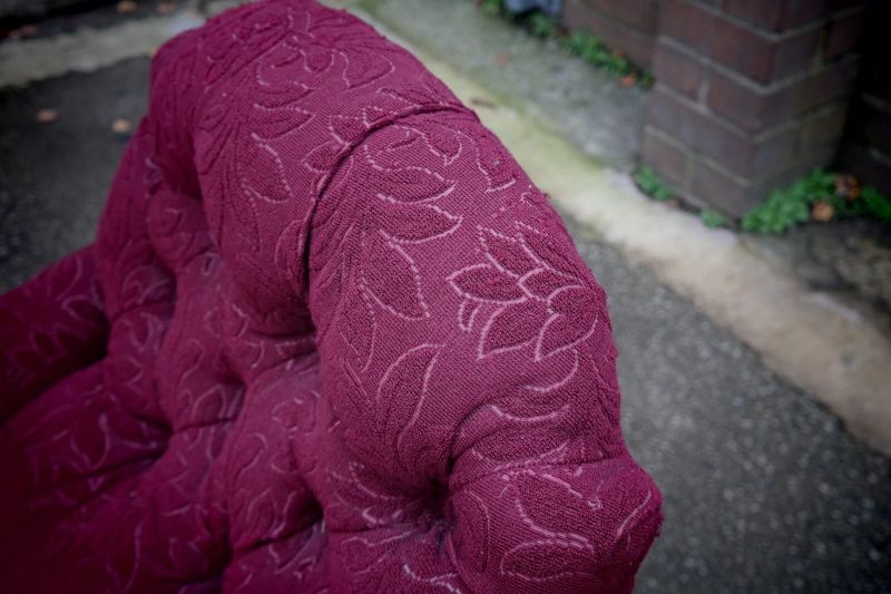 A Howard & Sons buttoned open armchair in Heavy Burgundy Fabric - Image 17